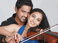 Asif Ali and Nithya Menon in Violin